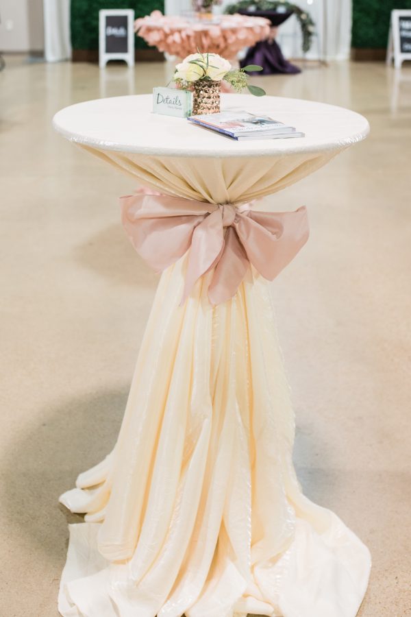 Ivory tablecloth with pink sash
